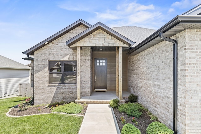 1305 W Ragweed Ct, Ozark, MO 65721 - view of exterior entry with brick siding