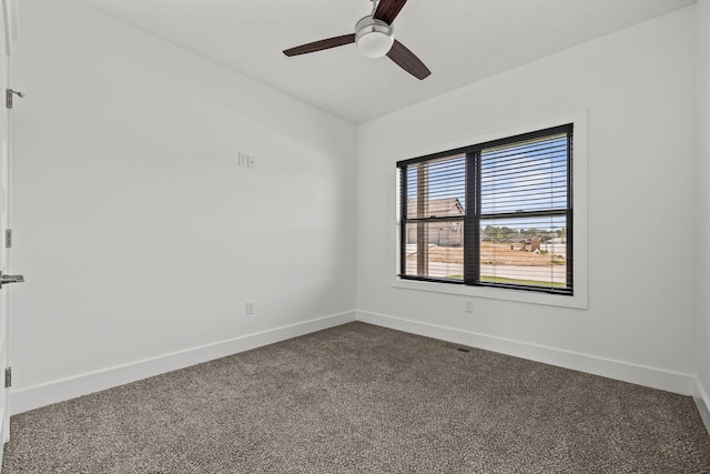 1305 W Ragweed Ct, Ozark, MO 65721 - empty room with dark carpet and ceiling fan