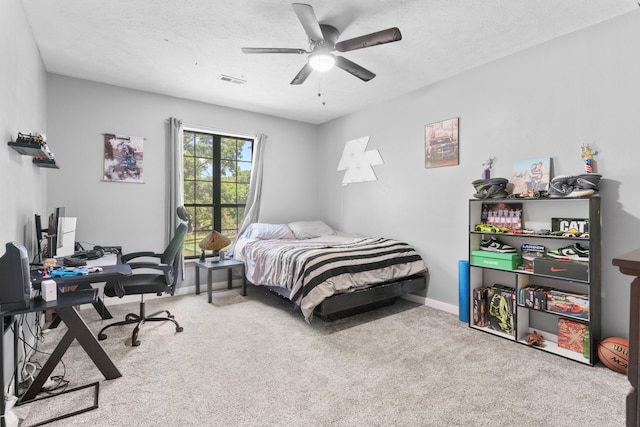 241 Sage Rd, Ozark, MO 65721 - carpeted bedroom with a desk, ceiling fan, and a textured ceiling