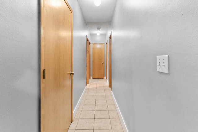 241 Sage Rd, Ozark, MO 65721 - hall with light tile patterned flooring and baseboards