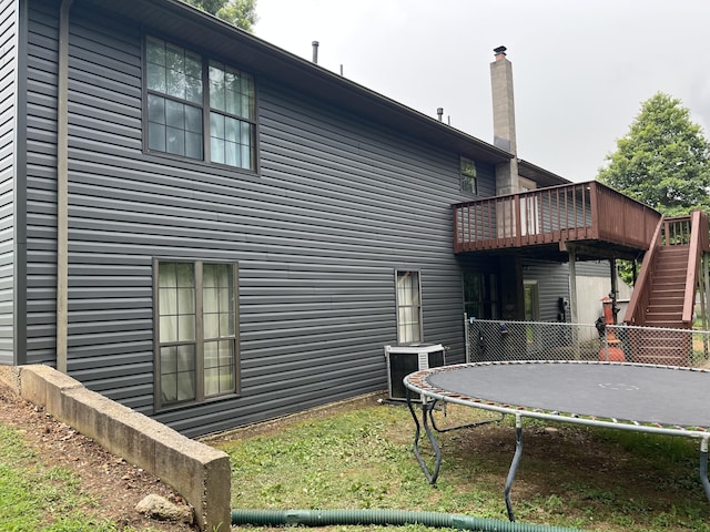 241 Sage Rd, Ozark, MO 65721 - back of house featuring a wooden deck and stairway