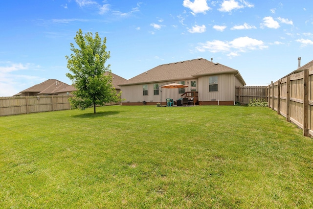 698 N Rockingham Ave, Nixa, MO 65714 - back of property with a fenced backyard and a deck