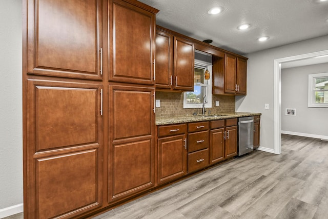 7047 W Lone Oak St, Springfield, MO 65803 - kitchen featuring dishwasher, backsplash, light wood finished floors, recessed lighting, and light stone countertops