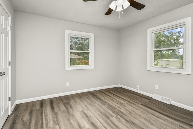 7047 W Lone Oak St, Springfield, MO 65803 - spare room with ceiling fan and wood finished floors