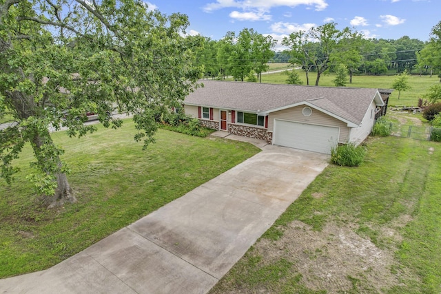 7047 W Lone Oak St, Springfield, MO 65803 - ranch-style home featuring an attached garage, driveway, stone siding, and a shingled roof