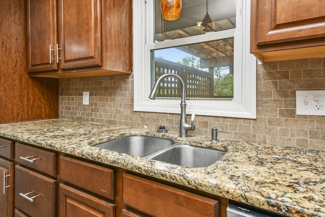 7047 W Lone Oak St, Springfield, MO 65803 - kitchen featuring tasteful backsplash and light stone counters