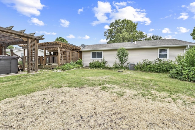 7047 W Lone Oak St, Springfield, MO 65803 - rear view of property featuring a pergola, a yard, and a hot tub