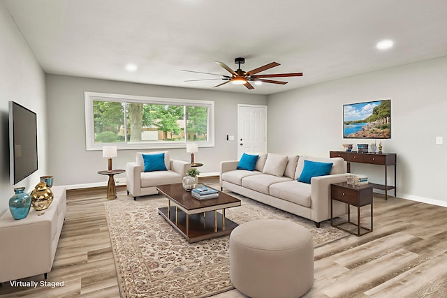 7047 W Lone Oak St, Springfield, MO 65803 - living area with light wood-style flooring, a ceiling fan, and recessed lighting