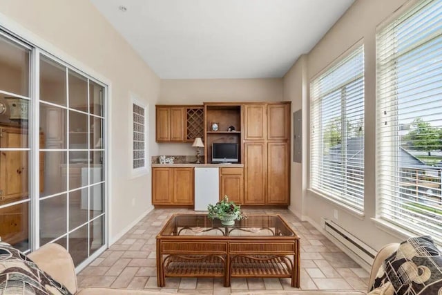 200 Glory Rd Unit B6, Branson, MO 65616 - kitchen featuring plenty of natural light, electric panel, open shelves, and fridge
