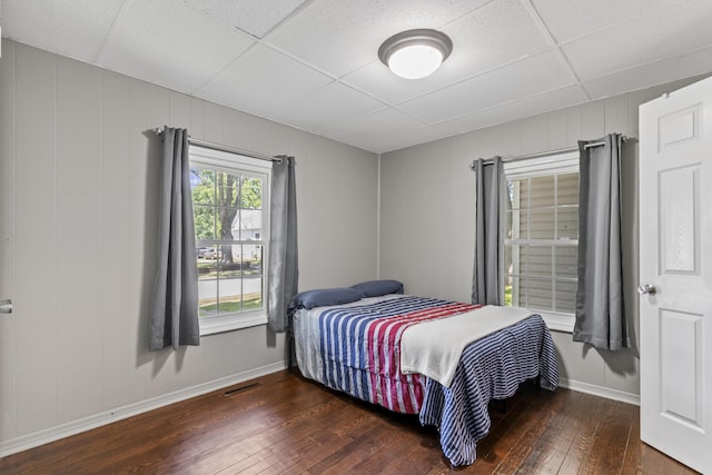 922 W Elm St, Springfield, MO 65806 - bedroom featuring hardwood / wood-style flooring and a paneled ceiling