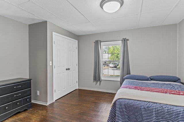 922 W Elm St, Springfield, MO 65806 - bedroom with wood finished floors and baseboards