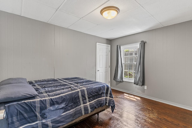 922 W Elm St, Springfield, MO 65806 - bedroom featuring wood finished floors and a paneled ceiling