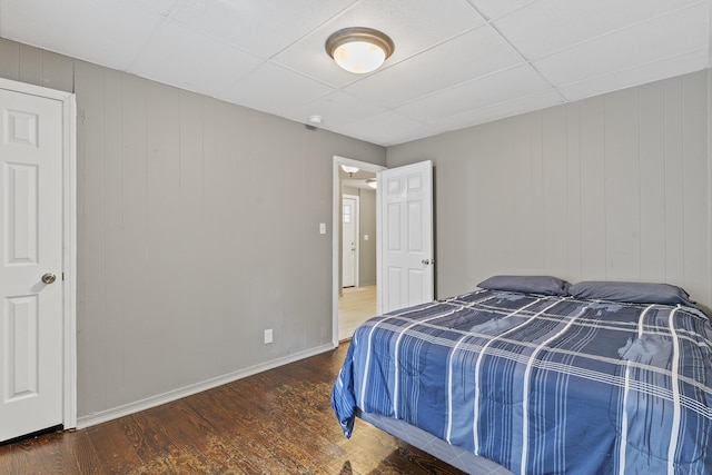 922 W Elm St, Springfield, MO 65806 - bedroom with wood finished floors and a drop ceiling