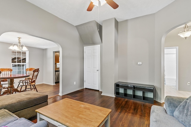922 W Elm St, Springfield, MO 65806 - living room with arched walkways, a ceiling fan, wood finished floors, and a chandelier