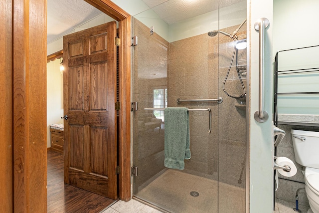 424 W Olive St, Bolivar, MO 65613 - full bath with a shower stall and wood finished floors