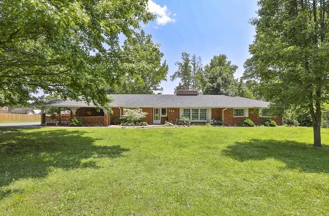 424 W Olive St, Bolivar, MO 65613 - ranch-style home featuring brick siding and a chimney