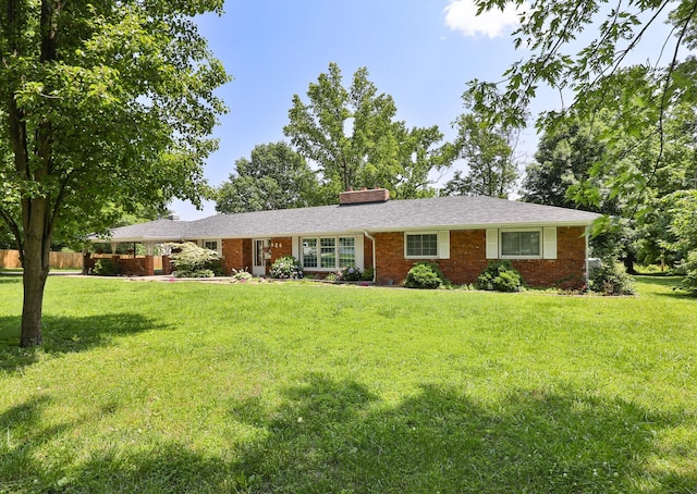 424 W Olive St, Bolivar, MO 65613 - ranch-style house with brick siding and a chimney
