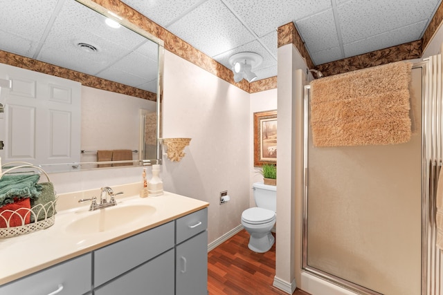 200 Eagle Pointe Dr, Branson, MO 65616 - bathroom with a paneled ceiling, wood finished floors, vanity, and a stall shower