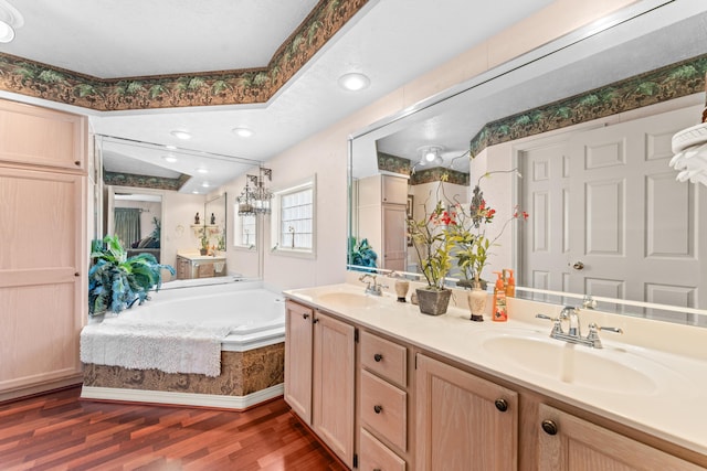 200 Eagle Pointe Dr, Branson, MO 65616 - full bathroom featuring wood finished floors, double vanity, and a bath