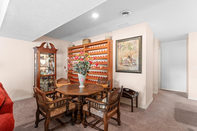 200 Eagle Pointe Dr, Branson, MO 65616 - carpeted dining room featuring baseboards and a textured ceiling