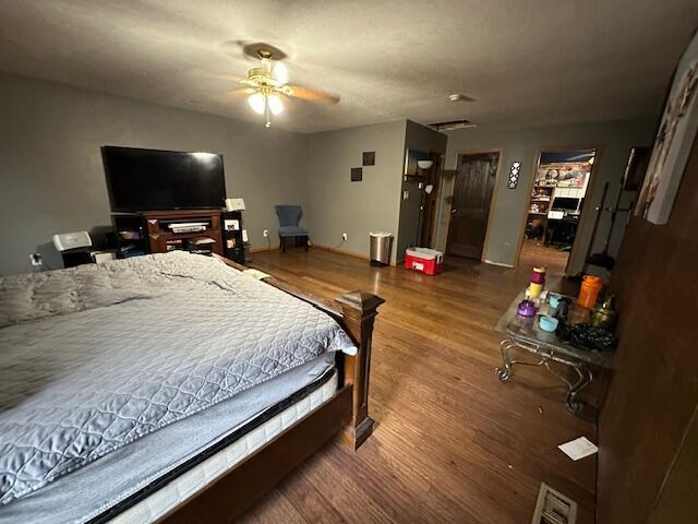3200 Driftwood Rd, Merriam Woods, MO 65740 - bedroom with wood finished floors