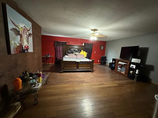 3200 Driftwood Rd, Merriam Woods, MO 65740 - bedroom with hardwood / wood-style flooring and ceiling fan