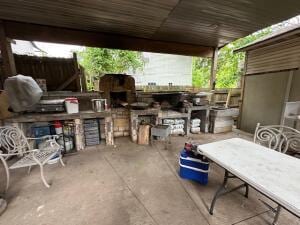3200 Driftwood Rd, Merriam Woods, MO 65740 - view of patio / terrace with an outdoor bar and exterior kitchen