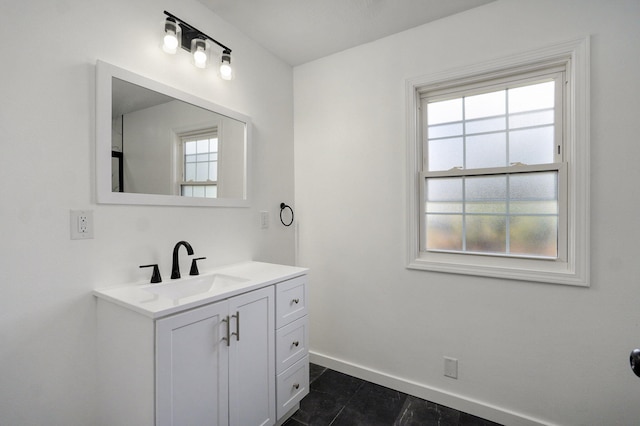 119 E Mill St, Republic, MO 65738 - bathroom with vanity, plenty of natural light, and tile patterned flooring