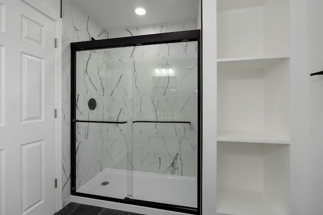 119 E Mill St, Republic, MO 65738 - full bathroom with a marble finish shower and built in shelves