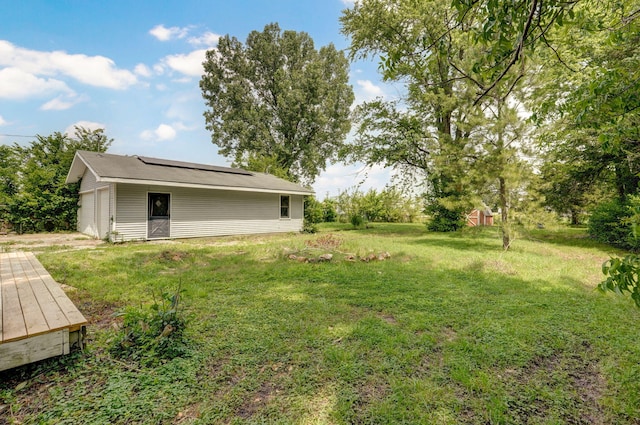 119 E Mill St, Republic, MO 65738 - view of grassy yard with an outbuilding and a garage