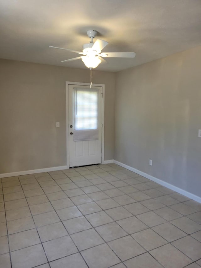 809 Elm Ave, Ava, MO 65608 - empty room with a ceiling fan and light tile patterned floors