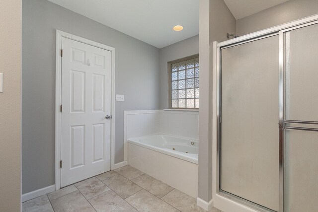 942 E Ozark Jubilee Dr, Nixa, MO 65714 - bathroom featuring a tub with jets, a stall shower, and tile patterned floors