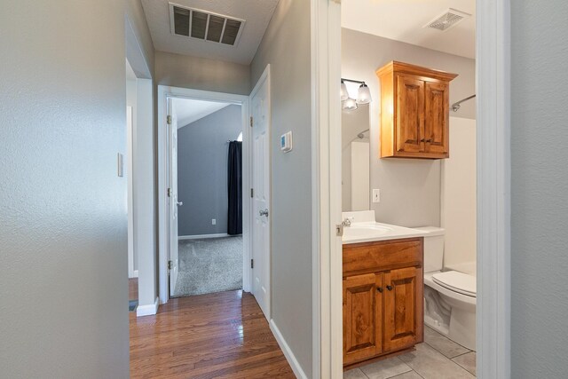 942 E Ozark Jubilee Dr, Nixa, MO 65714 - corridor with light wood-type flooring and a sink
