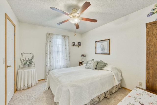202 N Harper Ave, Springfield, MO 65802 - bedroom with a textured ceiling, light carpet, and ceiling fan