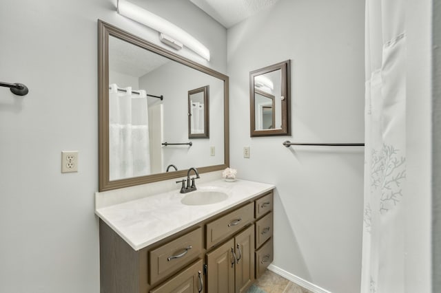 202 N Harper Ave, Springfield, MO 65802 - bathroom with vanity, a shower with shower curtain, and a textured ceiling