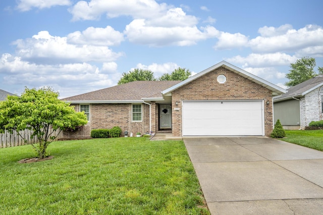 202 N Harper Ave, Springfield, MO 65802 - single story home featuring an attached garage, driveway, a front lawn, and brick siding