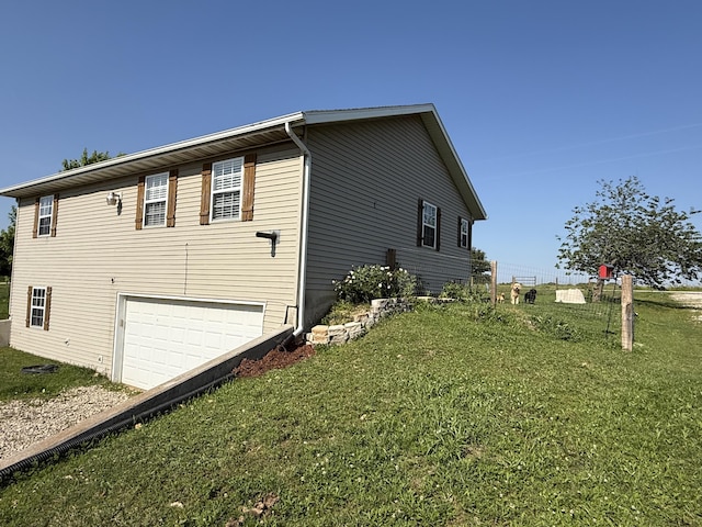 551 State Highway O, Seymour, MO 65746 - view of side of property with a garage, a yard, and driveway
