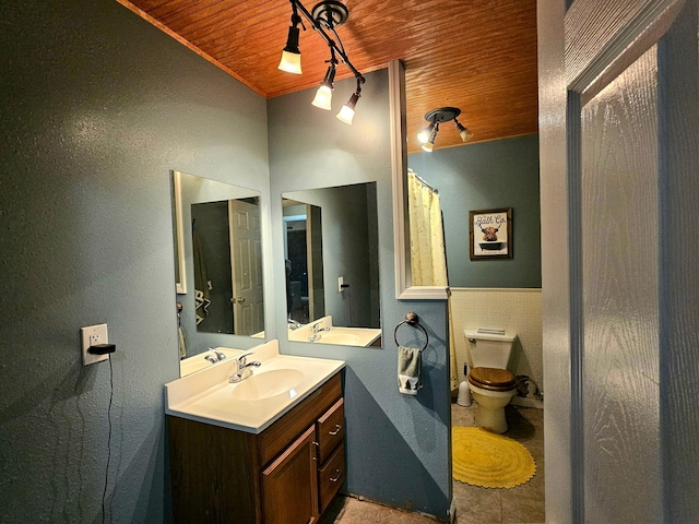 551 State Highway O, Seymour, MO 65746 - bathroom with wooden ceiling, vanity, tile patterned flooring, a textured wall, and tile walls