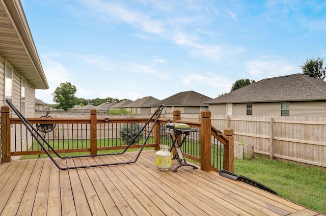 5618 W Sugar Pine Dr, Springfield, MO 65802 - wooden terrace featuring a fenced backyard, area for grilling, and a residential view