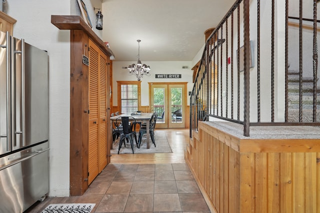 109 Grand Mountain Ave Unit 39-1, Branson, MO 65616 - dining space featuring a chandelier and stairway