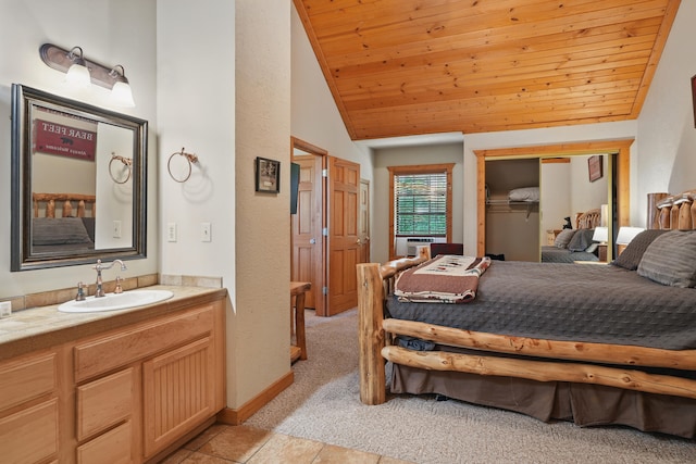 109 Grand Mountain Ave Unit 39-1, Branson, MO 65616 - bedroom featuring vaulted ceiling, wood ceiling, light tile patterned floors, a closet, and light colored carpet
