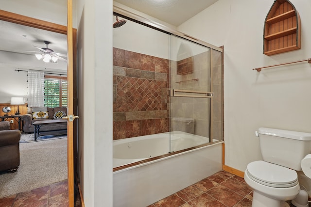 109 Grand Mountain Ave Unit 39-1, Branson, MO 65616 - bathroom with combined bath / shower with glass door, connected bathroom, a ceiling fan, and stone finish floors