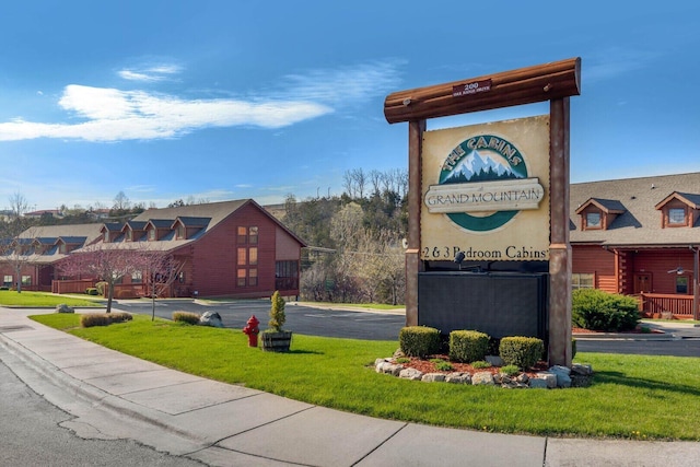 109 Grand Mountain Ave Unit 39-1, Branson, MO 65616 - community / neighborhood sign with a lawn and a residential view
