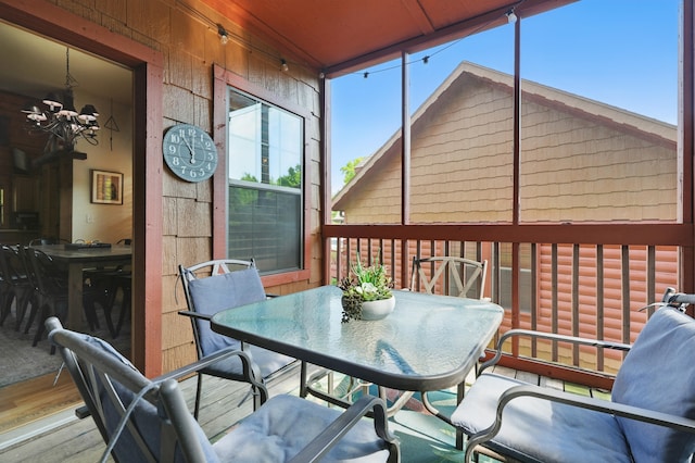 109 Grand Mountain Ave Unit 39-1, Branson, MO 65616 - sunroom / solarium with outdoor dining area and a chandelier