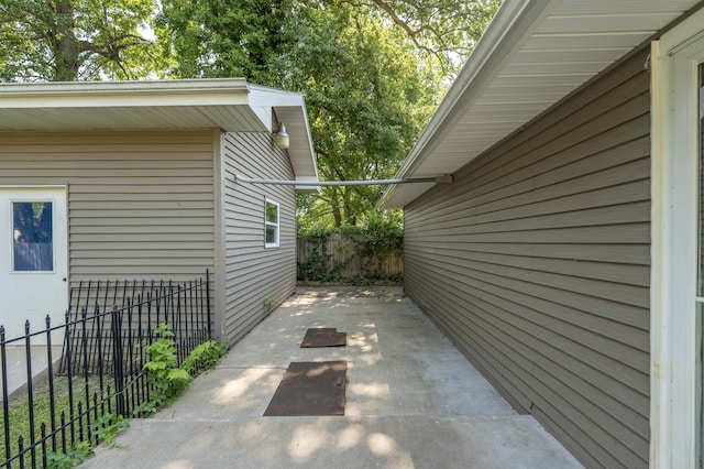 3153 W Washita St, Springfield, MO 65807 - view of side of property with a patio area