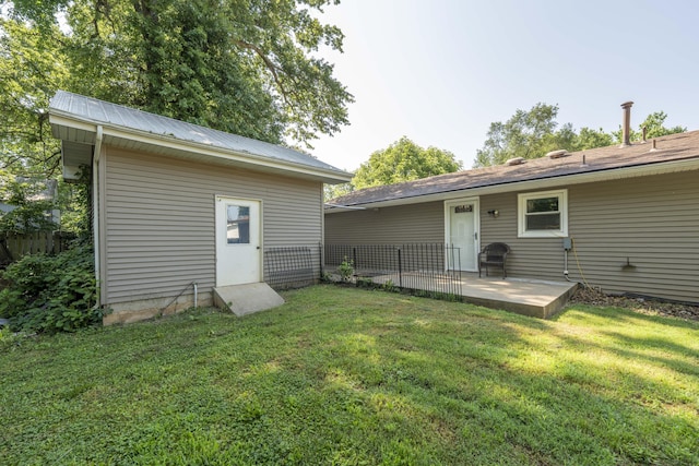 3153 W Washita St, Springfield, MO 65807 - rear view of property featuring a patio area and a metal roof