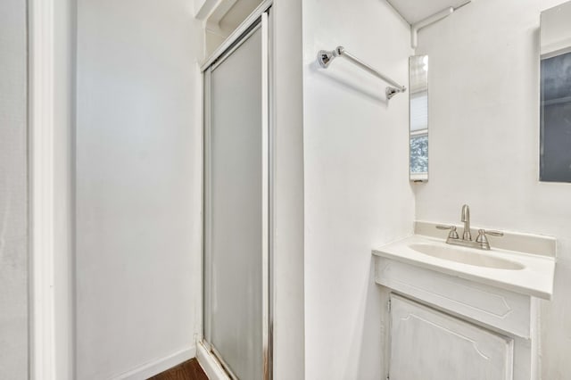 3153 W Washita St, Springfield, MO 65807 - bathroom featuring a shower stall and vanity
