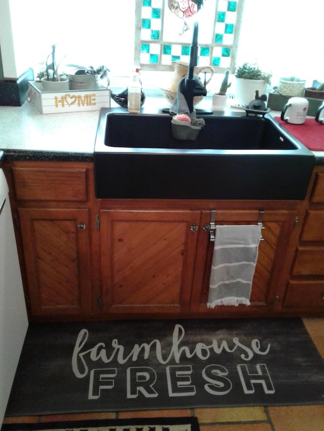 701 Spears Ave, Crane, MO 65633 - kitchen with a sink and brown cabinetry