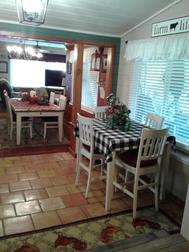 701 Spears Ave, Crane, MO 65633 - dining space with crown molding and vaulted ceiling