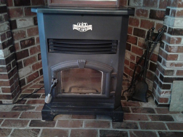 701 Spears Ave, Crane, MO 65633 - detailed view of a wood stove and heating unit